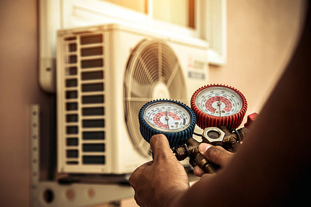 Professional Heat Pump Repair technician working in Oregonia, OH